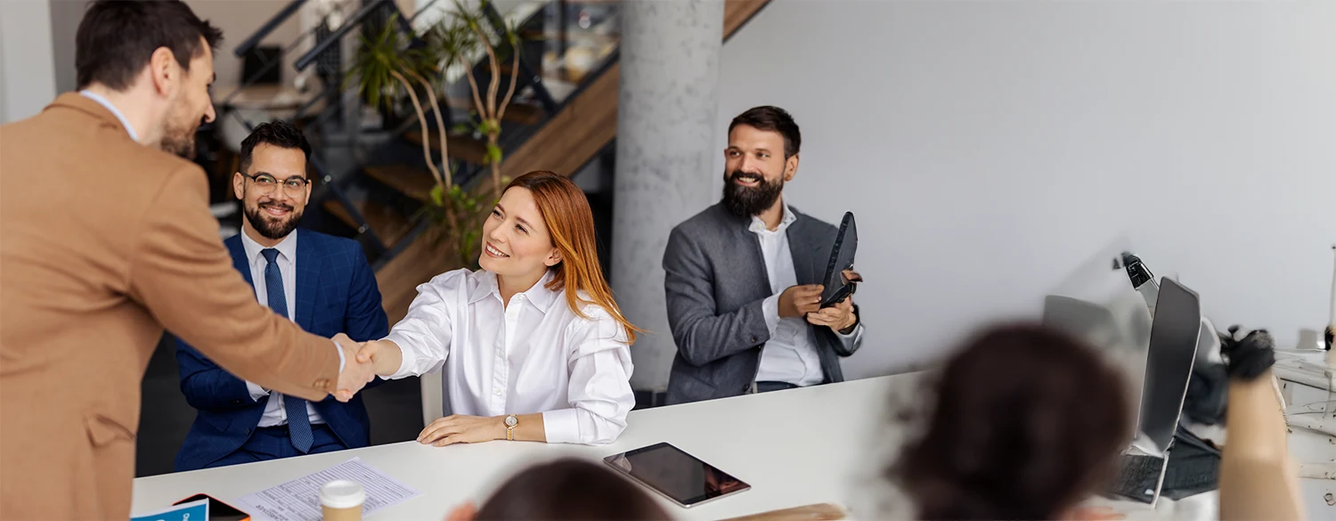 Reliant Surveyors advisers meeting with a client